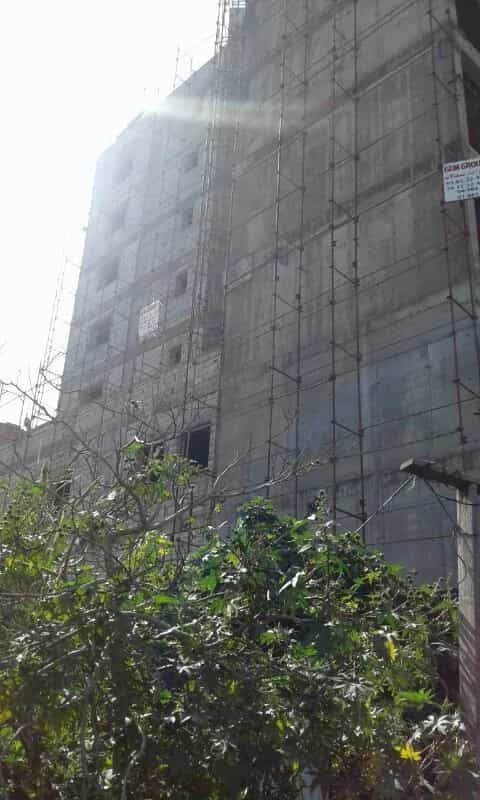 تغطية سقالات واجهة كاملة على مبنى صناعي في الزوق، بيروت.